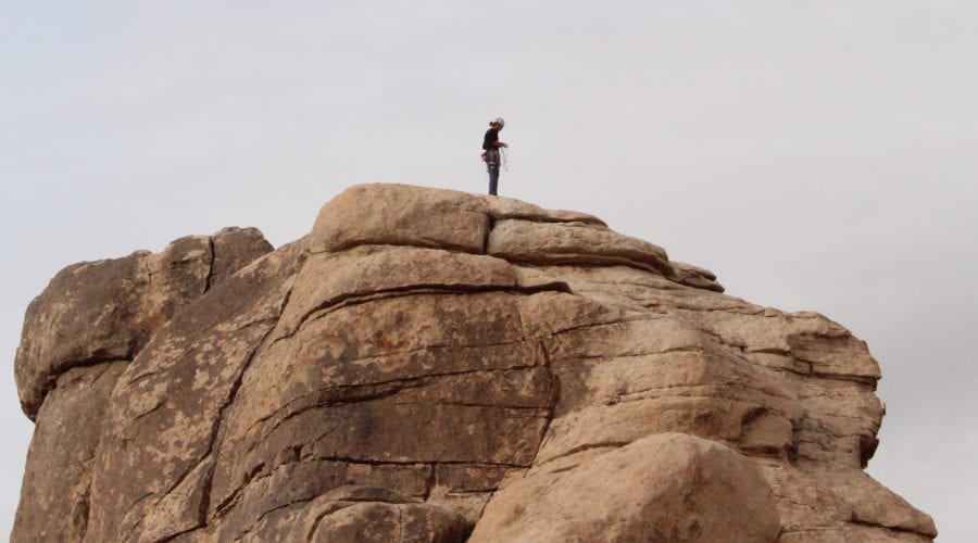 person on rock formation